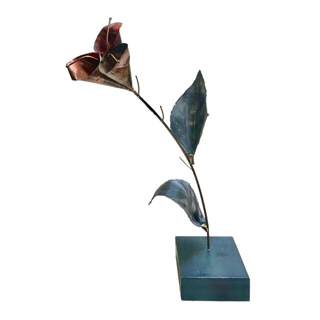A mid century mixed metal Brutalist sculpture of a lily; finely fabricated of brass and steel as seen at the stem, and...