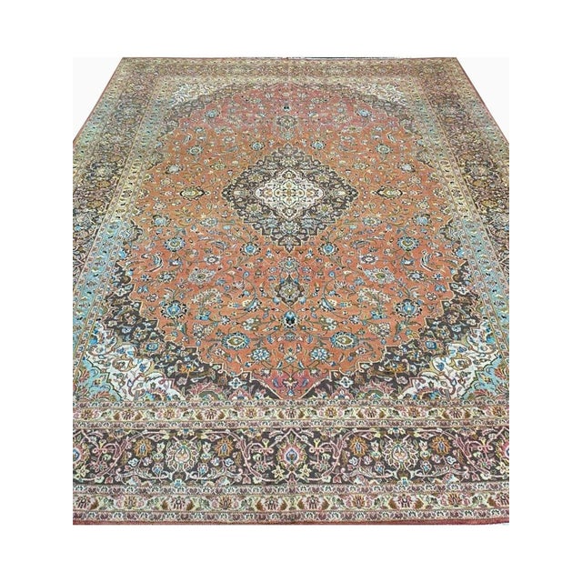 Adorn your living space with the exceptional beauty of this 10x13 Old Persian Kashan area rug. Handwoven in Persia, this...