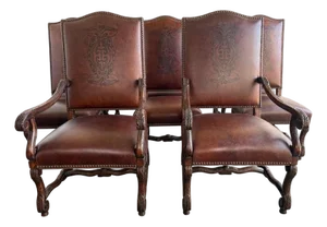 Set of Eight Spanish Revival Leather and Carved Walnut Dining Chairs