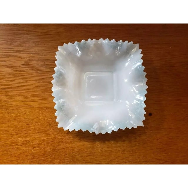 This is a Vintage Diamond Point Ruffled Edge Opalescent Candy/Trinket Dish. It measures 1 3/4" high at the highest point...