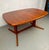 Elevate your dining or living space with this beautifully crafted mid-century teak table by Rasmus, a stunning example of...