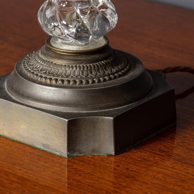 Vintage 20th Century pair of French column shaped clear crystal stemmed table lamps, featuring bronze plinths and...