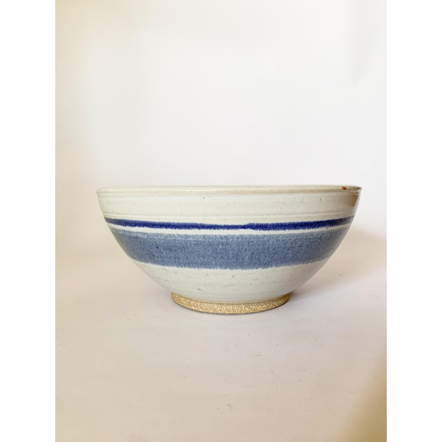 We love a good blue and white piece of pottery, and this large mixing bowl is no exception. The milky glaze shows off...