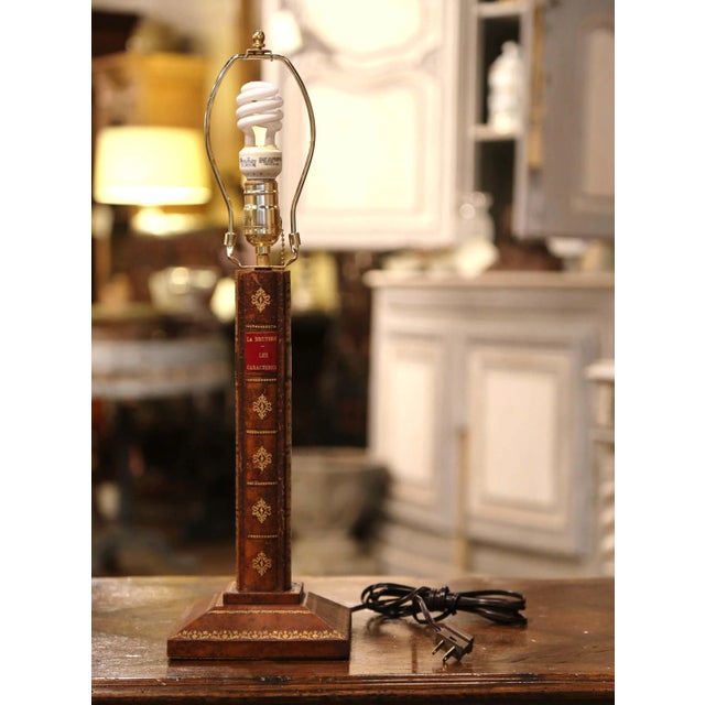 Bring a refined literary accent to a desk, library, or bedside with this distinctive French table lamp, crafted circa...