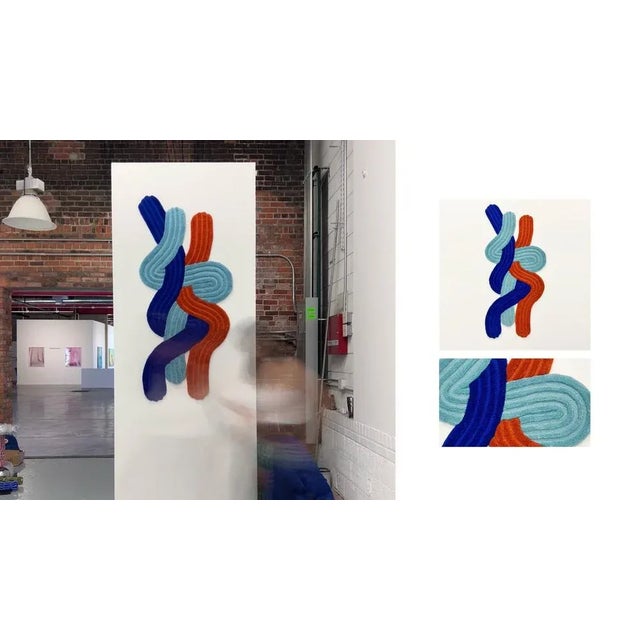 Entwine rugs are crafted through hand-tufting, a technique that involves inserting loops of yarn through a fabric backing...