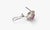 Stunning 18K white gold earrings featuring natural oval rubies surrounded by a sparkling halo of round brilliant and...