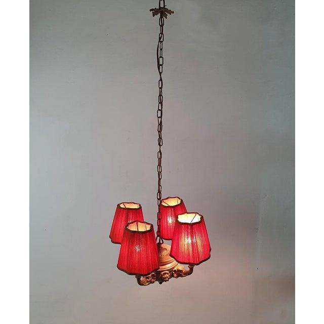 This pendant is simply unique and charming. Produced in France around the year 1900. It has four arms in the shape of...
