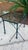 Pair of Giacometti Style Wrought Iron Verdigris Finish Glass Top Side Table For Sale - Image 11 of 12