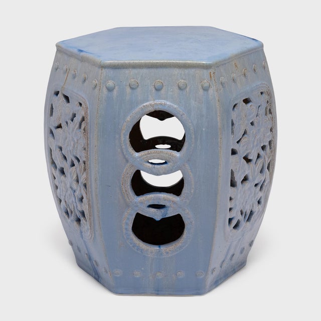 Sculptural and drenched in color, this ceramic garden table reinvents the barrel shape of classic Chinese drum stools....