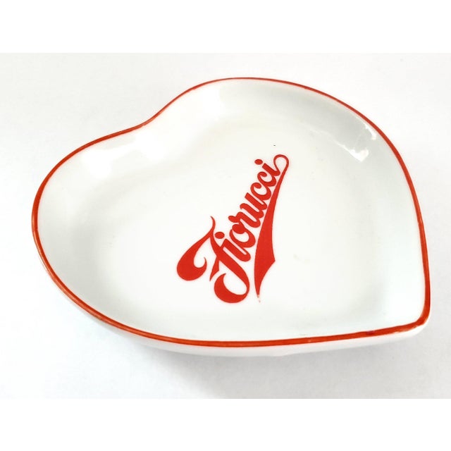 Offering a vintage 1980s Fiorucci "New Wave" Italian porcelain heart-shaped trinket dish, ashtray or vide poche. This rare...