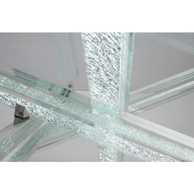 This coffee table is a masterpiece of design and craftsmanship, created by famous French designer Maurice Barilone for the...