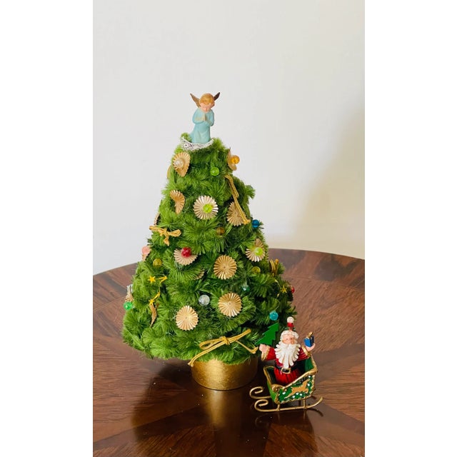 Small 8 vintage miniature Christmas Tree with ornaments and praying angel figurine on top., Small Santa Claus figurine in...
