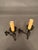 Pair of 19th-century French hand-wrought iron wall sconces dating to circa 1890. Each sconce features an elongated,...