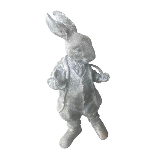 A charming and beautifully detailed vintage cast iron garden statue depicting an anthropomorphic "Dapper Rabbit" or White...