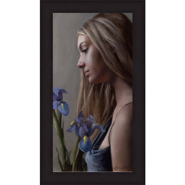 This oil on panel artwork features a serene profile of a young woman, her gaze contemplative as she is softly illuminated...