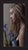 This oil on panel artwork features a serene profile of a young woman, her gaze contemplative as she is softly illuminated...