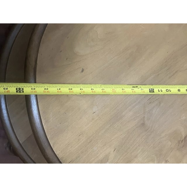 Add classic mid-century charm to your home with this VTG 1950s Hand-Made Solid Maple Wood Round Two-Tier End Table....