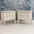 A charming pair of Italian bedside commodes from the late 19th century painted a soft cream with a subtle gray outlining...