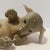 This porcelain Dachshund puppy is just too adorable. You can almost feel her continuous efforts to roll over, while her...
