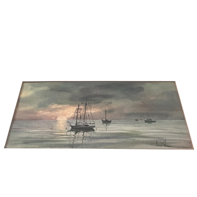 Original watercolor signed by listed artist, Joan Howe Titled Sundown. In very good framed condition under clear...