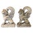 This striking pair of cast stone winged griffins (or winged lions) is sculpted in a majestic seated position, facing...