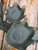 A delightful example of mid-20th century American cast iron garden and indoor decor, this multi-bowl plant stand features...
