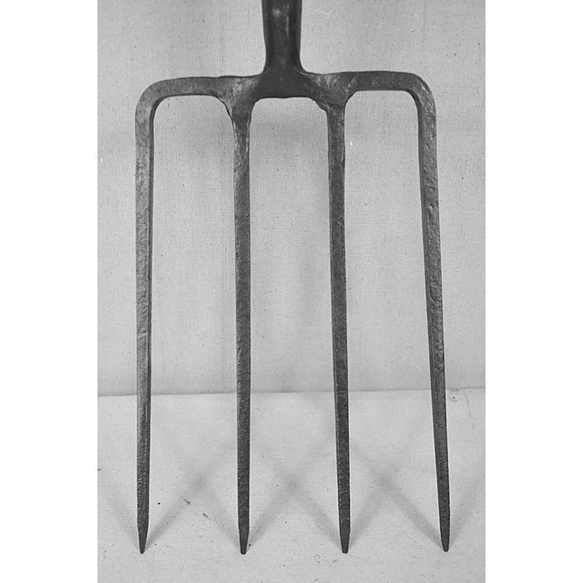 An English gardening fork dating from the Edwardian period as the beginning of the 20th century. It is very sturdily made...