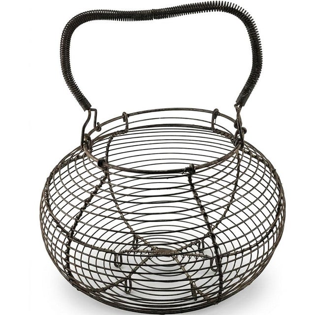 The item shown is a vintage French wire egg basket (traditionally referred to in France as a panier à salade or fil de fer...
