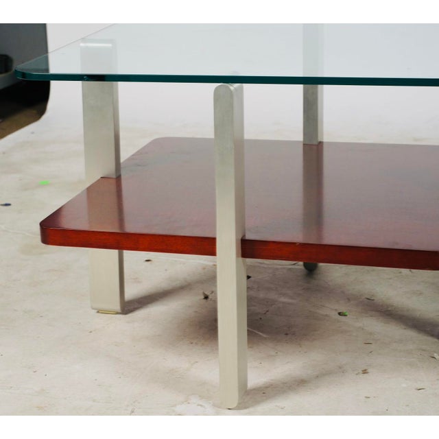 Elegant pair of Bernhardt contemporary end tables combining glass, brushed aluminum, and rich espresso-finished wood....