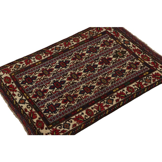 Hand knotted in wool, this 4x6 Baluch rug represents a new line of tribal carpets in the Modern Classics Collection by Rug...