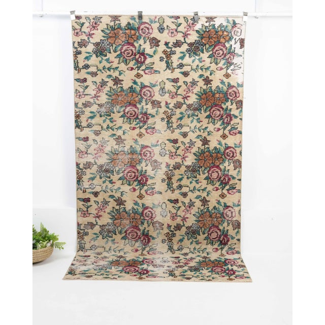 Vintage Turkish Hand-Knotted vintage rug is a semi-antique vintage Area rug.'70s Eastern region of Turkey's unique rug is...
