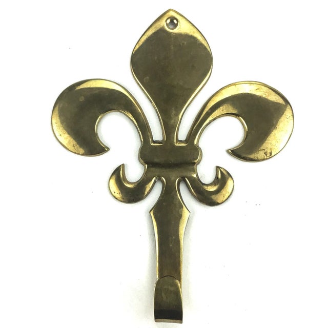 Wonderful vintage solid brass coat hook. In unpolished condition and very few scratches. This beautiful piece will look...