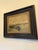 Oil on canvas painting, titles Fishing Boats. The composition captures a peaceful harbor where a cluster of fishing boats...