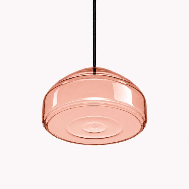 Crafted with high visual clarity, this modern pendant lamp features a sleek silhouette hand-blown from premium glass in a...