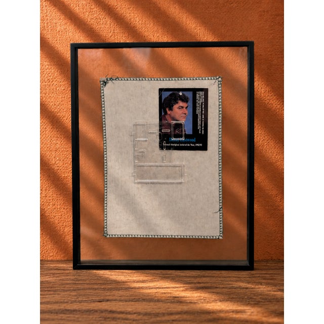 Striking vintage framed textile artwork featuring “The Corroboree” by Aboriginal Australian artist Danny Eastwood, dating...