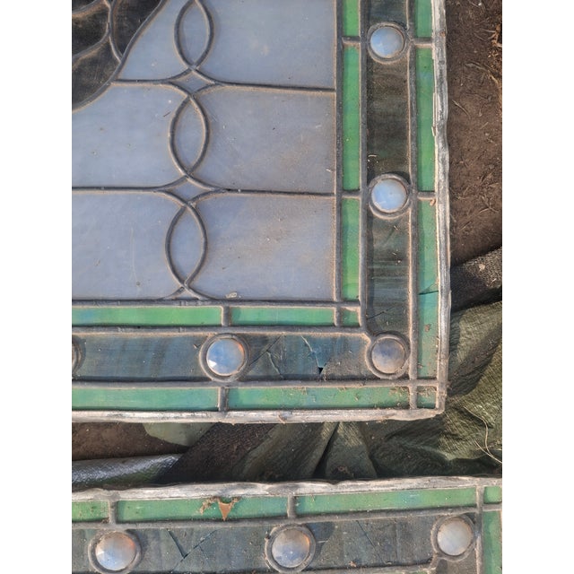 Art Nouveau style floral and ribbon or wreath motifs, complete with green and white opalescent/textured glass and jewel...