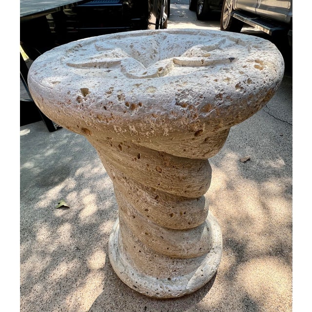 Description Substantial solid limestone pedestal featuring a dramatic sculptural spiral form and deeply carved five-point...