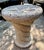 Description Substantial solid limestone pedestal featuring a dramatic sculptural spiral form and deeply carved five-point...