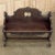 19th Century Italian Hall Bench was sculpted from fine walnut, and features an elaborately scrolled design including a...