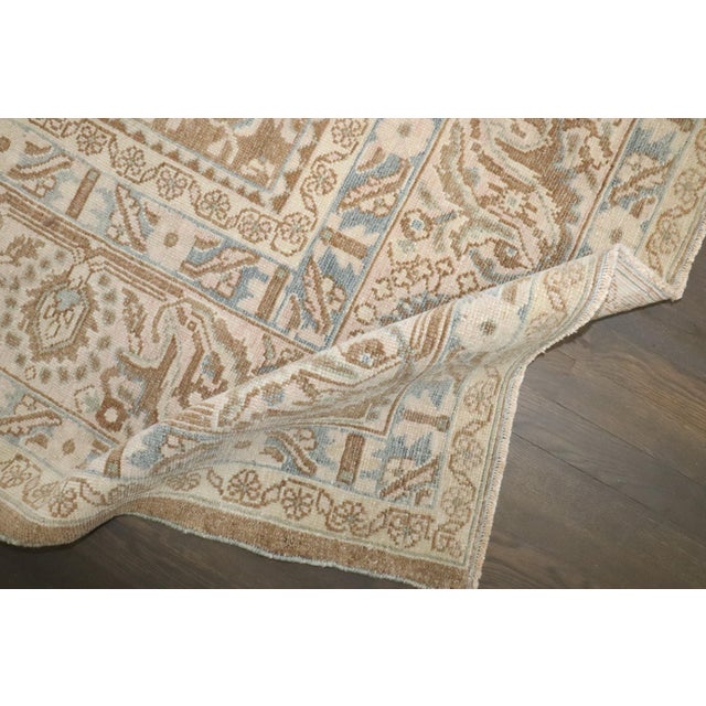 An early 20th-century Persian Brown Malayer Rug