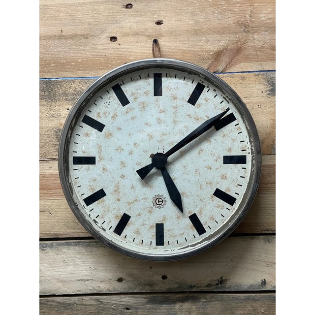 1950s Czechoslovakian era factory clock. Clock has a emblem with the letters " CH " on the face of the clock. These kinds...