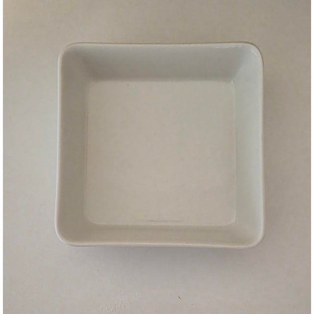 A beautiful trio of square serving dishes attributed to renowned Finnish designer Kaj Franck. Likely part of the iconic...