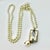 1990s Vintage Chippendale Art Deco Nutcracker Babble on Faux Pearls Christmas Pendant Necklace, 40” For Sale - Image 6 of 17