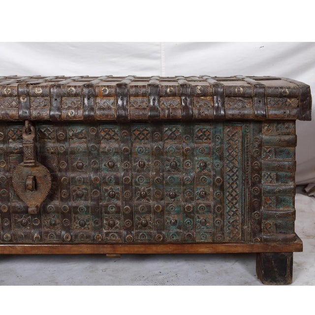Antique Indian Teakwood Pitara Chest "Bed Bench", with outstanding iron and brass decoration to the facade and iron...