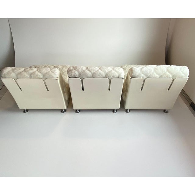 4-seater sofa Fiberglass shells. No wood! The back of one shell has been repainted. The upholstery has never been...