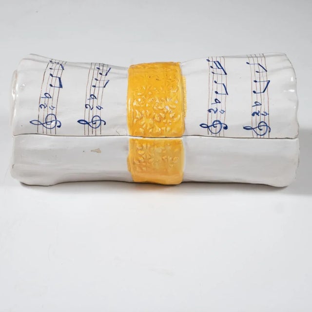 Ceramic bundled sheet music form decorative box. Signed CUE Italy t596