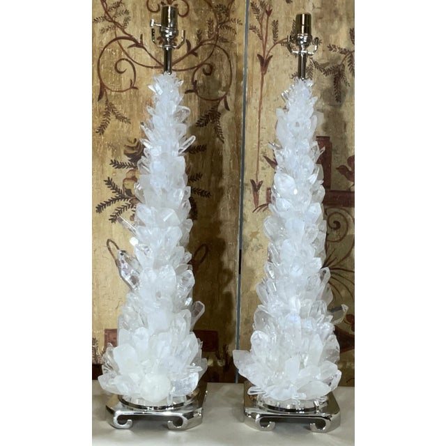 These stunning rock crystal quartz table lamps are a true masterpiece of nature and craftsmanship. Each lamp features a...