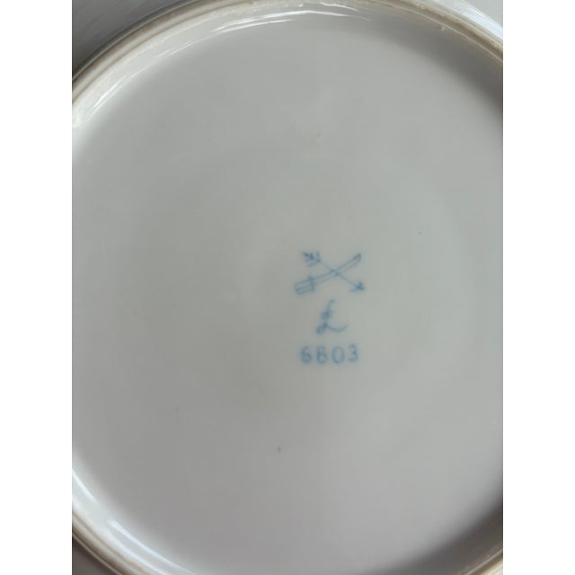 This is a set of 6 porcelain dessert plates painted with a delightful multi colored floral pattern. The edges are slightly...