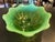 This is a stunning green bowl made by a Northwood glass in the beautiful pearl flower pattern. It has a gorgeous green...