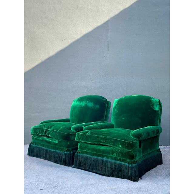 This stunning pair of vintage lounge chairs epitomizes the high-glamour aesthetic of Hollywood Regency design. Upholstered...